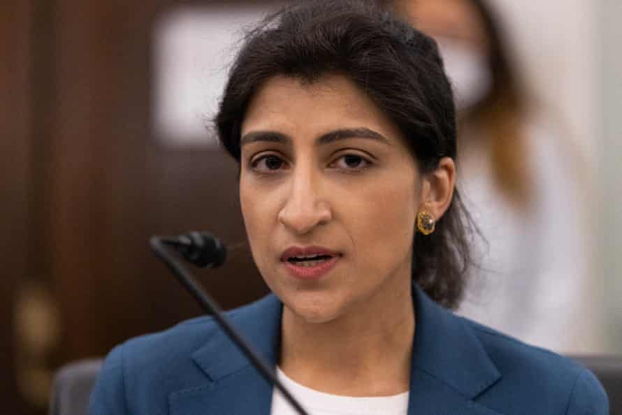 Lina Khan, wearing a blue blazer, testifies during a Senate hearing.