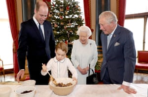2019: Prince William, Prince George, the Queen and Prince Charles prepare special Christmas puddings in the music room at Buckingham Palace in December, 2019. The Royal British Legion has given 99 Christmas puddings mixed by four generations of the royal family to members of the armed forces community across the UK and overseas as part of its Together at Christmas initiative
