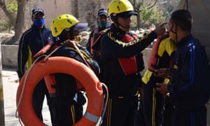 State disaster response fund personnel prepare for deployment in Srinagar, Uttarakhand state.