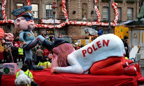 A carnival float depicting the chairman of the Law and Justice party, Jarosław Kaczyński, oppressing Poland.