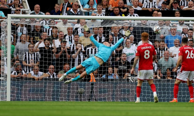 Newcastle United’s Callum Wilson scores their second goal past Nottingham Forest’s Dean Henderson.