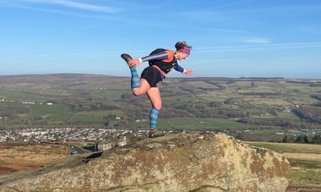 Rose George practising yoga on Ilkley moor in the middle of a run, before she had Covid. 