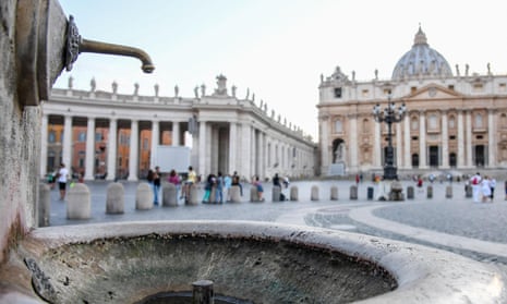 A dry fountains is seen in St Peter’s Square at the Vatican.