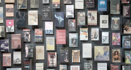 A wall on which more than 50 books are on display