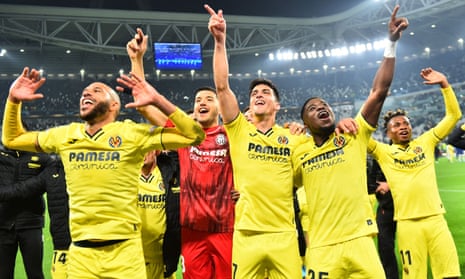 Villarreal's opening goalscorer Gerard Moreno (centre) celebrates with his teammates after the match.