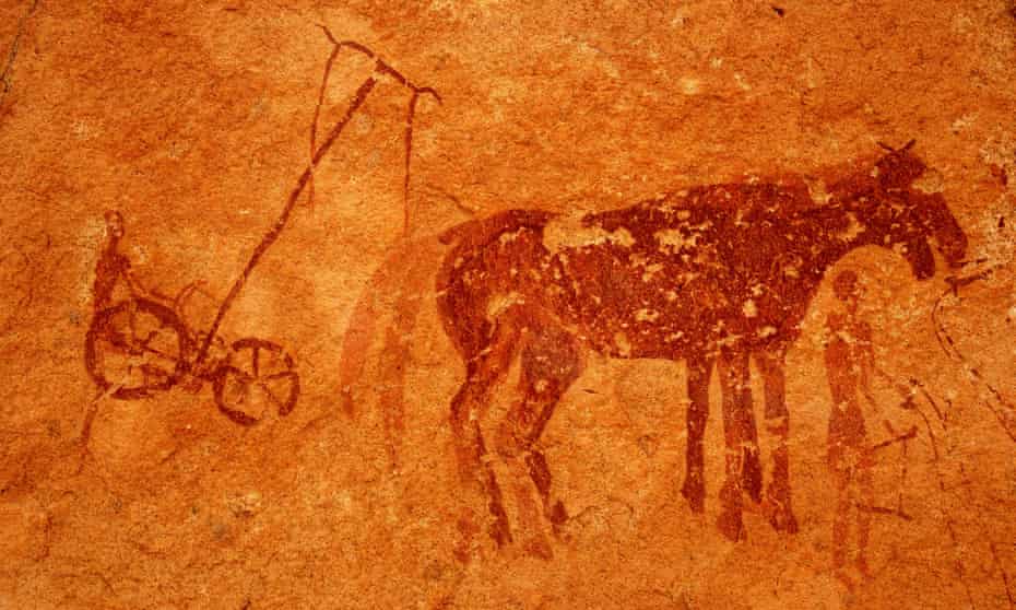 Rock painting in Tassili Maghidet, Libya, showing a plough and horses.