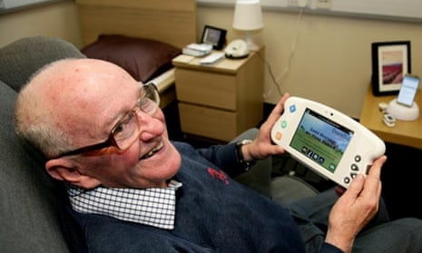 Patient Gerald Hicks trying out some of the technology involved in Surrey and Borders NHS Trust’s trial.