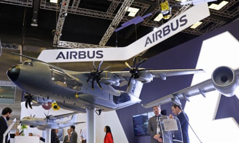 Visitors stand at the Airbus pavilion at an exhibition in  Doha 