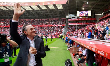 Cesare Prandelli waves to Valencia fans at his first La Liga match, a 2-1 victory over Sporting Gijon.
