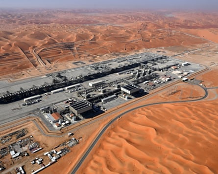An oil refinery surrounded by desert.