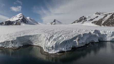 Icebergs and snow-covered mountains in Antarctica