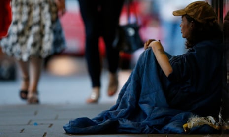 Homeless woman on street, London