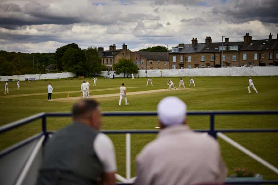 Yorkshire cricket’s great divide: ‘We’ve got to stop looking over the fence at each other’ | Cricket 7 Supporters look on as Bowling Old Lane’s second team take on East Bierley.