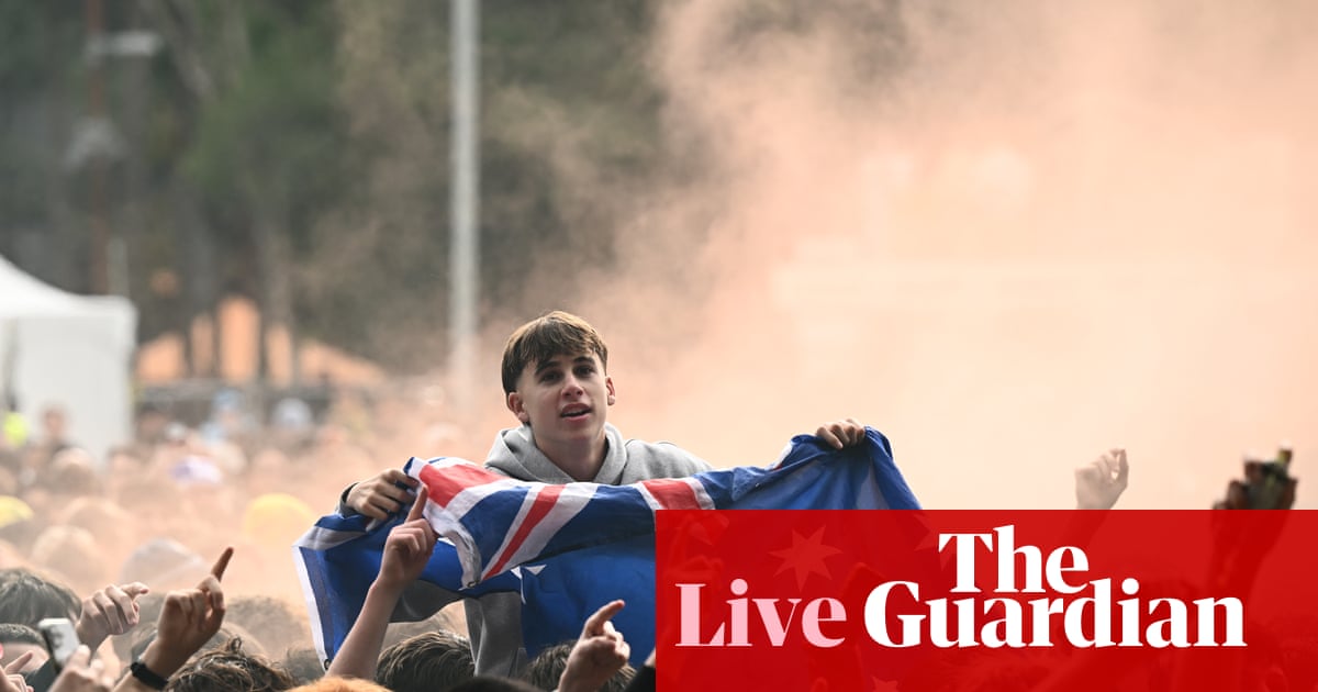 Australia news live: Socceroos fans pack city sites; police arrest woman after death at aged care home in Sydney