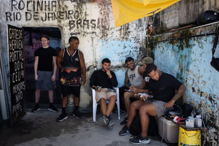 British tourist Jack Kelly Boswell stands in a doorway as he prepares to step out on to the Gateway to Heaven rooftop