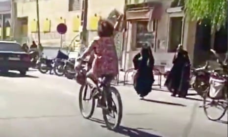 A still from the video apparently showing the woman riding a bicycle without wearing a head covering in Najafabad.