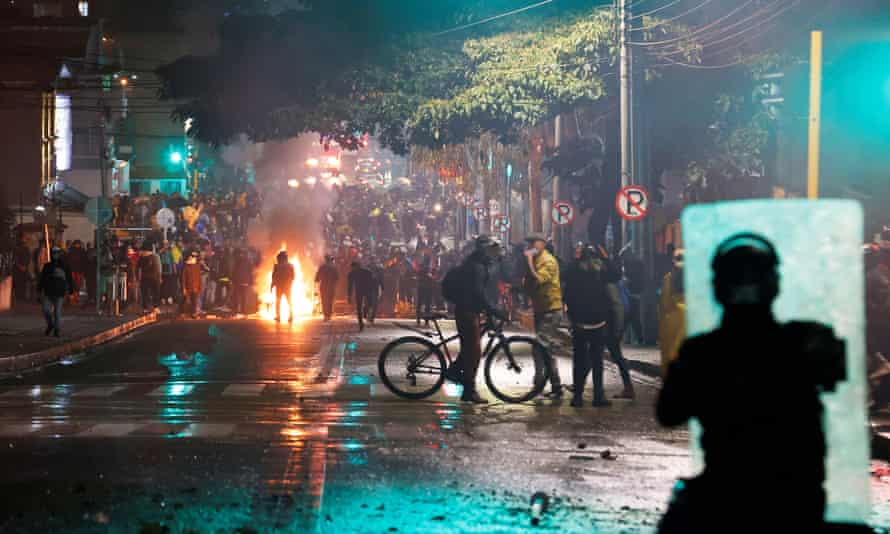 Demonstrators confront police in Bogotá as protests over tax reform entered a fourth day on Saturday.