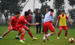 Phillippe Troussier watches a training session in Vietnam