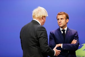President Macron (right) with Boris Johnson at the Cop26 summit.