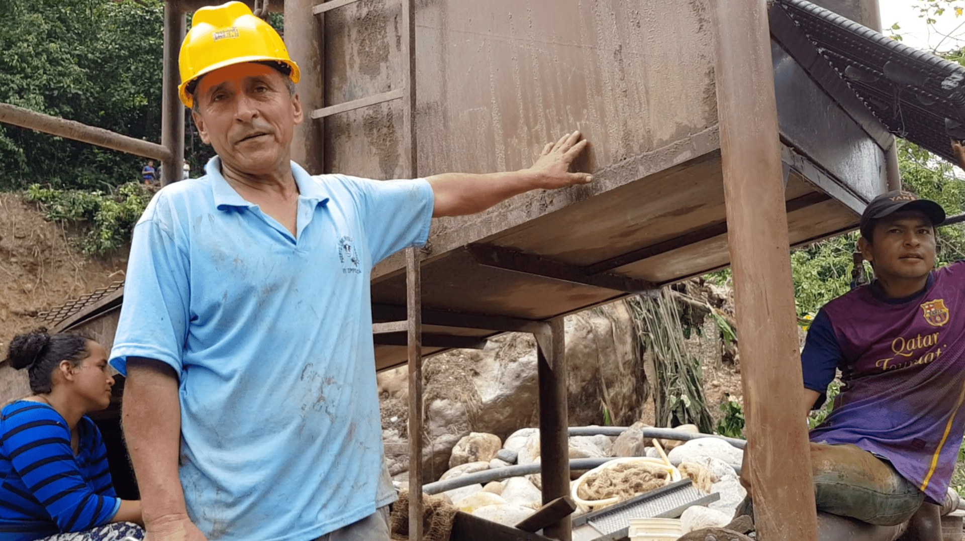 “Joselito” and two of the other miners at the new site discovered by the A’I Cofan. Joselito identified the woman behind him as the “boss.” Photograph: Nicolas Mainville/Amazon Frontlines