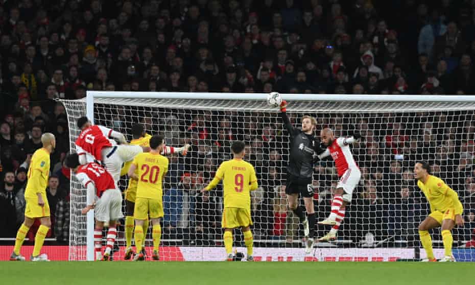 Caoimhín Kelleher punches the ball from Arsenal's Alexandre Lacazette