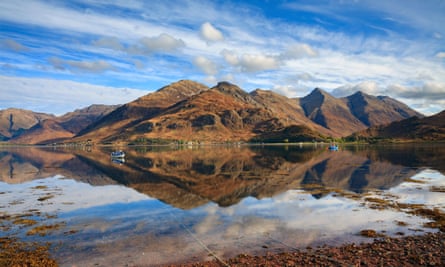 The Five Sisters of Kintail reflected in Loch Duich.