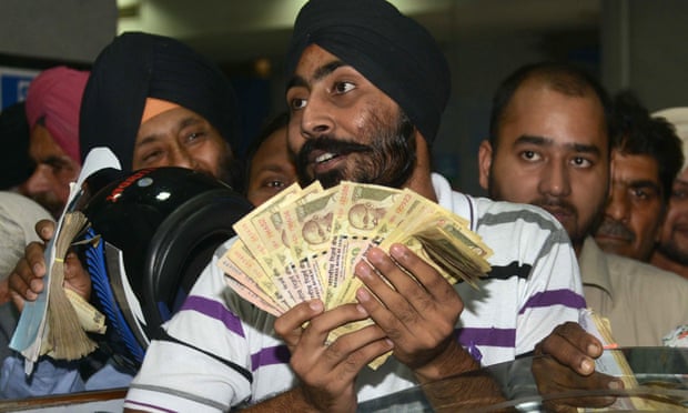  Customers at a bank in Amritsar. Many Indians were left without cash for their daily expenses. Photograph: Narinder Nanu/AFP/Getty Images