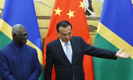 Solomon Islands prime minister Manasseh Sogavare, left, and Chinese premier Li Keqiang in Beijing in 2019