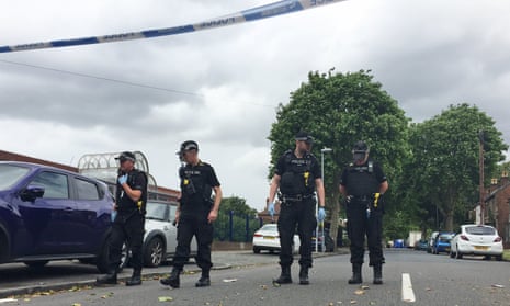 Police search the scene in Erdington where James Teer was shot dead on Thursday.