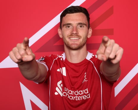 Liverpool’s Andrew Robertson points whilst posing for a portrait.