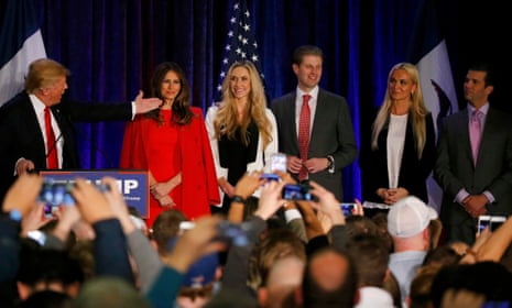 Republican Presidential Candidate Donald Trump speaks with his family onstage at caucus night rally in Des Moines, Iowa/