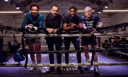 Danny Dyer, second left, with George, Triston and Carl leaning on the ropes of a boxing ring at West London Boxing Academy.