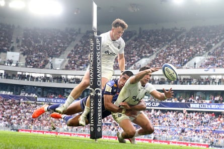 Bath full-back Santi Carreras (right) is tackled by Salesi Rayasi during the Champions Cup semi-final