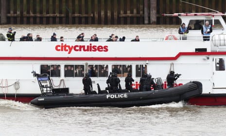 Armed officers respond after police pretending to be terrorists hijack Thames pleasure boat.