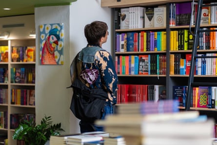 A customer browsing the shelves in Sens bookshop in Pechersk, Kyiv.