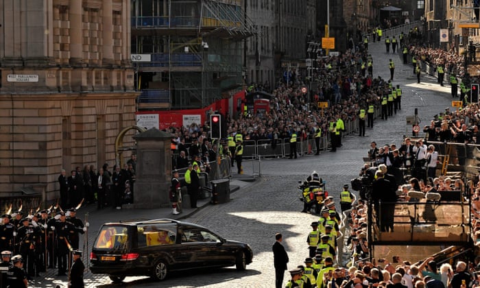 The hearse carrying the coffin of Queen Elizabeth II, leaves from from St Giles’ Cathedral in Edinburgh.