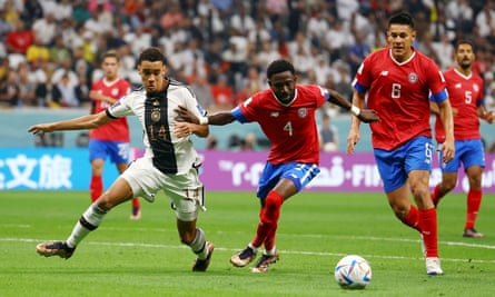 Germany's Jamal Musiala battles for the ball against Costa Rica