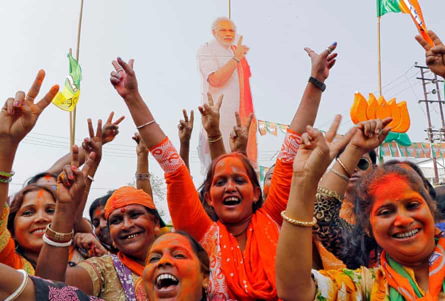 Supporters of India’s ruling BJP celebrate state election results in Agartala in March.