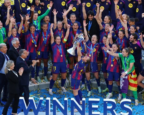 Barcelona's Ewa Pajor lifts the Women’s Champions League trophy