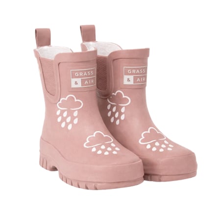 A pair of pink shortie wellies with white rain cloud and raindrop designs