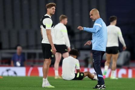 Manchester City Manager Pep Guardiola with John Stones during the training session ahead of UEFA Champions League 2022/23 final on June 09, 2023 in Istanbul, Turkey.