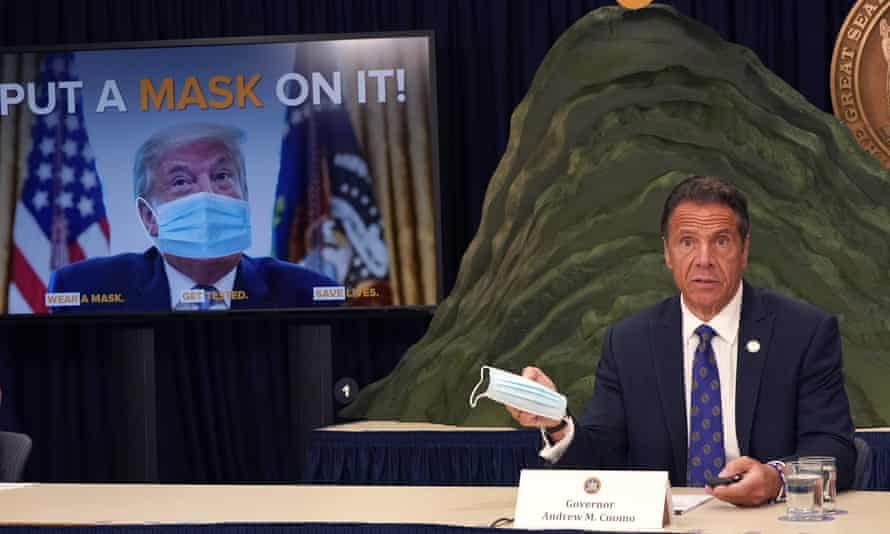 Andrew Cuomo said the president was enabling the coronavirus pandemic by not wearing a mask and downplaying the problem.