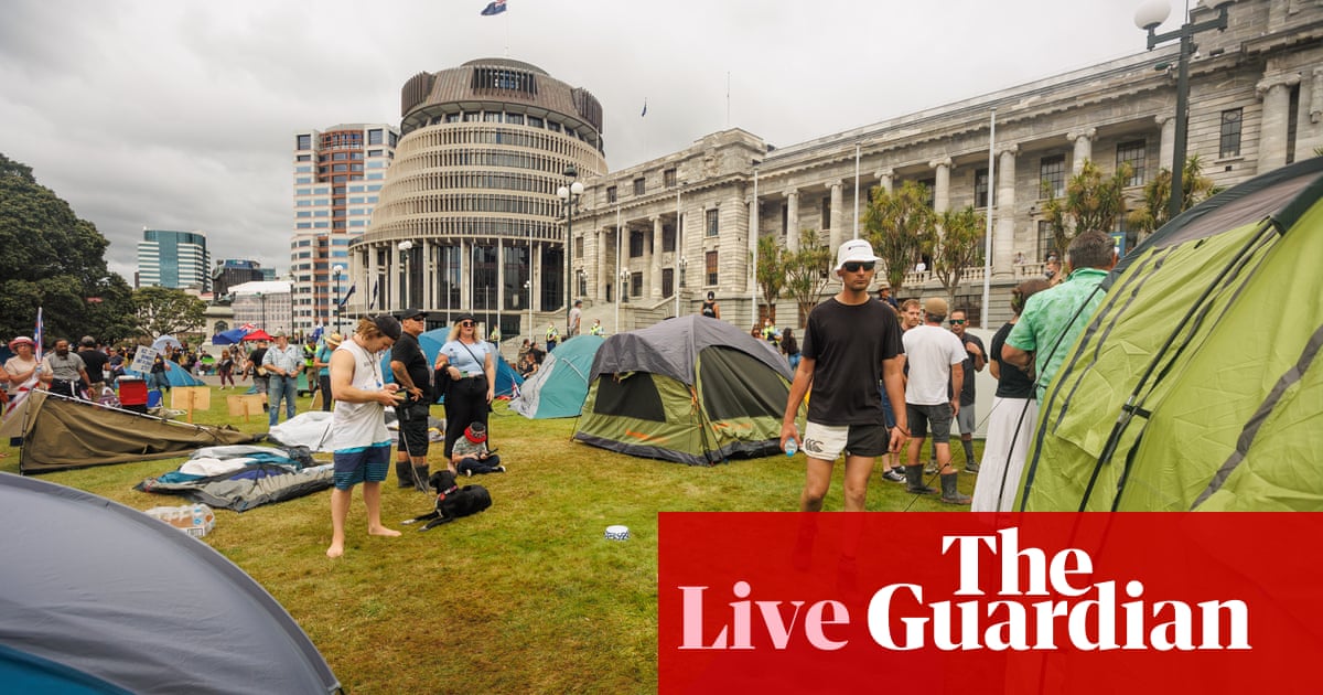Covid live: New Zealand protesters settle in for weekend; China promises support to Hong Kong as cases spiral