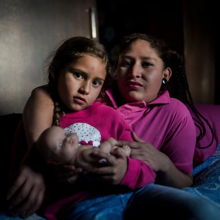 Valentina, seven, and her mother, Ivonne, in their bedroom.