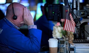 Traders work during the opening bell at the New York Stock Exchange on March 5, 2020.