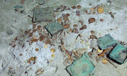 Ambrotypes and daguerreotypes intermixed with gold coins and jewellery among wreckage of SS Central America.