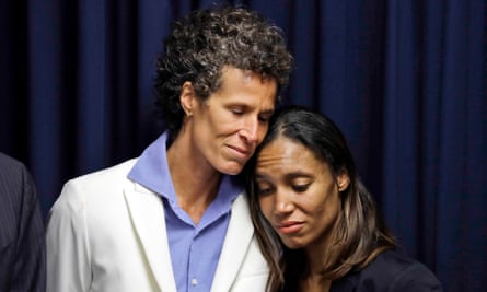 Bill Cosby accuser Andrea Constand, left, embraces prosecutor Kristen Feden during a news conference after Cosby was found guilty.