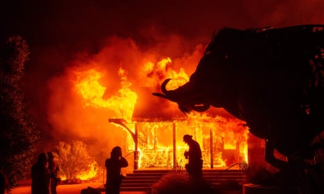 The Soda Rock Winery burns during the Kincade fire as flames race through Healdsburg, California on Sunday.