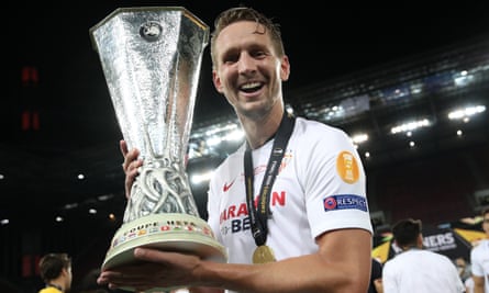 Luke de Jong with the Europa League trophy after scoring twice for Sevilla against Inter.