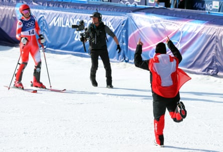 Franjo von Allmen runs towards Tanguy Nef.
